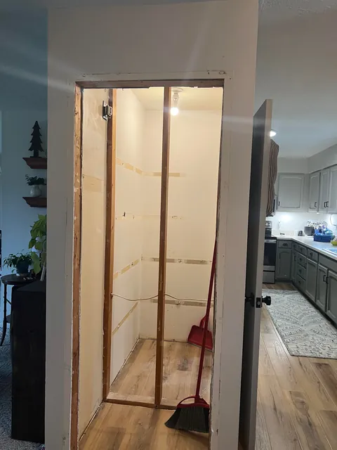 Reclaimed unused coat closet for pantry expansion