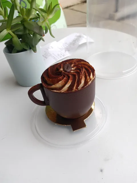 [I ate] Tiramisu in an edible chocolate cup