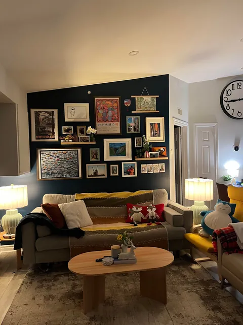 We finally put up our gallery wall in the living room and it feels very cozy!