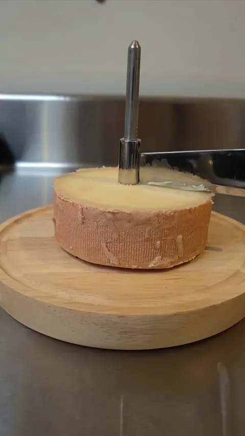 Tete de Moine cheese shaving on a Girolle