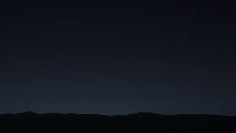 The tiny white dot in the centre of the image is earth as seen from the Mars.