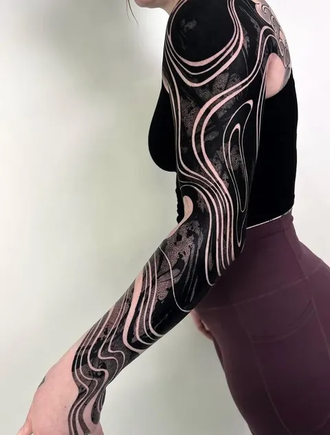 Blackwork coverup sleeve tattoo done by @___p_e_s_t_e___ at All Sacred Tattoo in Denver