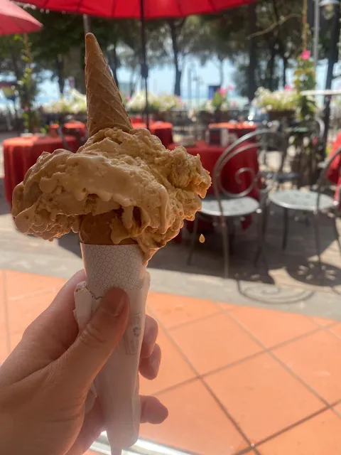 My wife took a picture of her ice cream and caught the perfect moment a drop fell.