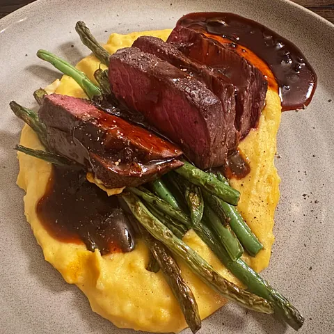 Venison with squash purée, green beans, and blueberry gastrique [OC]