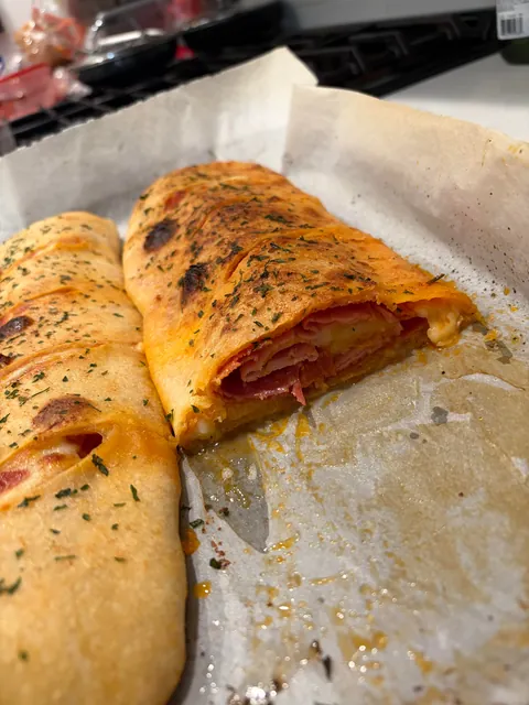 [homemade] Stromboli! Thin layer of marinara, Genoa salami, pepperoni and ham with provolone cheese.