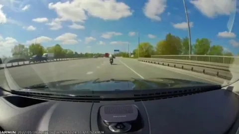 Guy knocks down a learning biker and then checks his car first