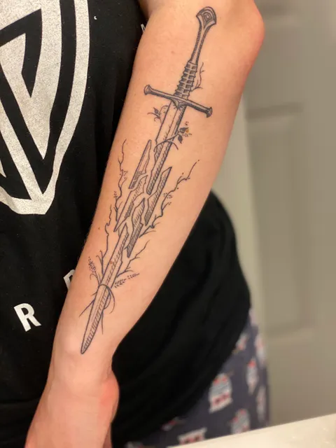 I might be biased, but this is my favorite iteration of the Shards of Narsil by far. Done by Martin Kelly at Body Electric Tattoo in LA.