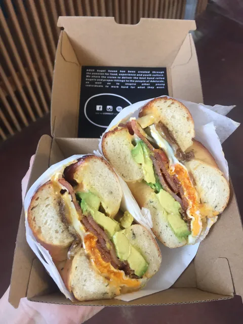 [I ate] Thyme and Salt Bagel with Fried Egg, Bacon, Avocado, Gouda Cheese, Caramelised Onion and Sriracha Mayo