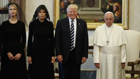 Francis stands with US President Donald Trump and his family at the Vatican in May 2017