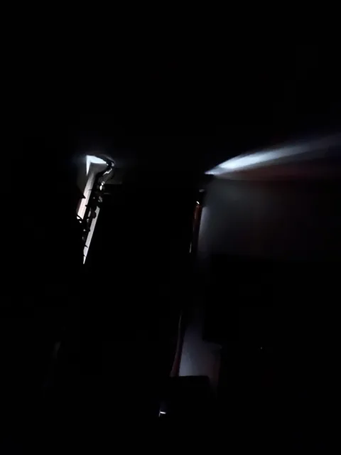 Shove a pool noodle into the opening between the window frame and the curtain rod to block sunlight (before and after)