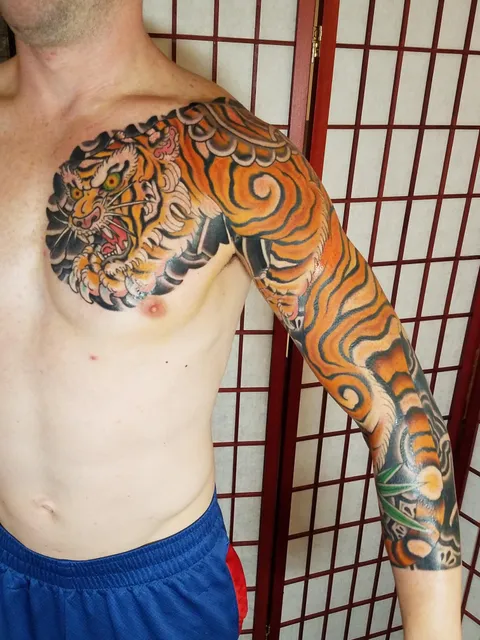 Japanese traditional tiger sleeve done by J Ranno of Red Thorn in Baltimore