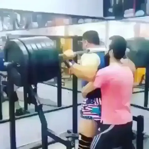 Bar snaps from the sheer weight as this guy squats