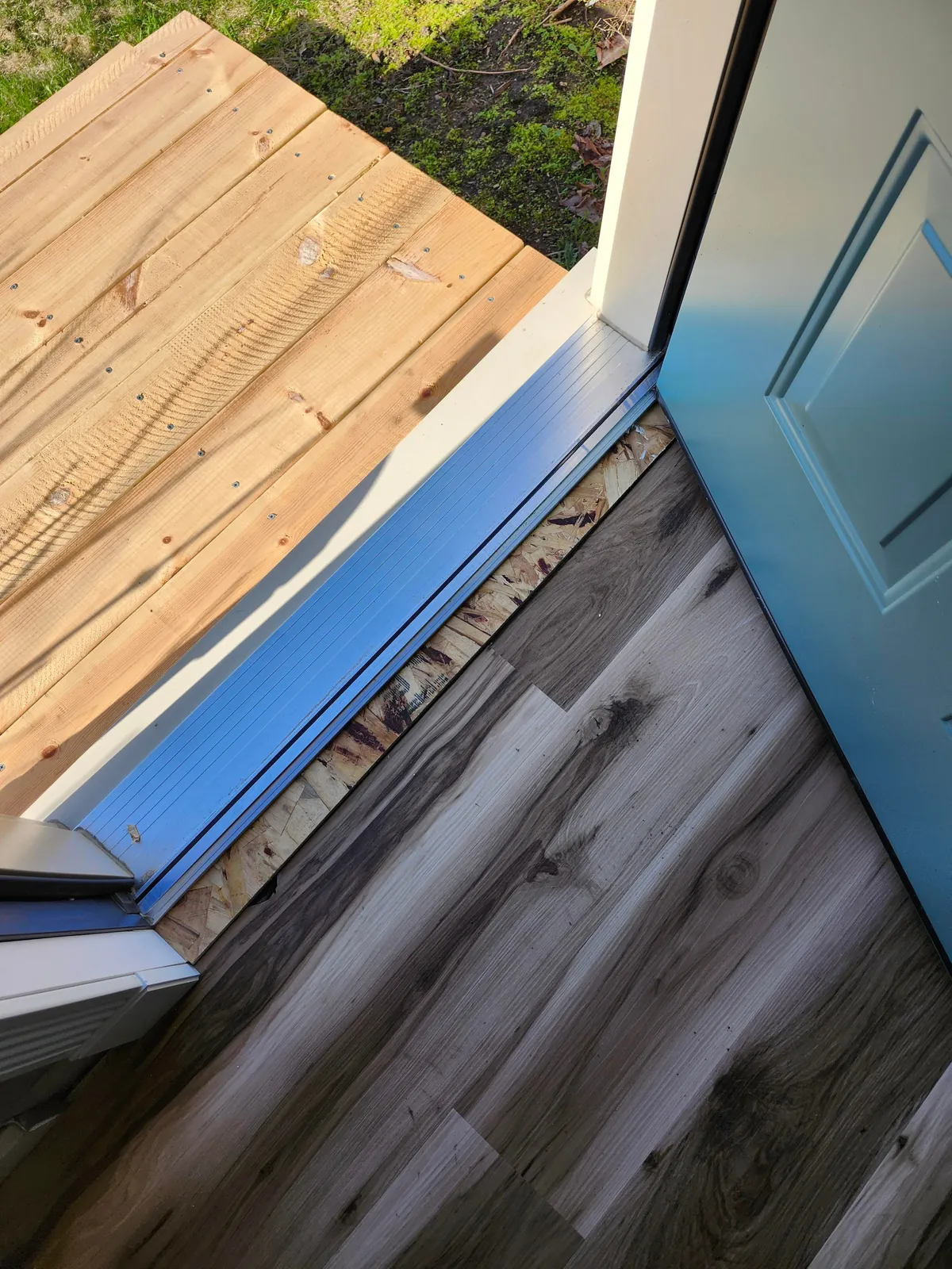 Contactors left this gap of plywood on the inside of the door. What are some ideas to cover it?