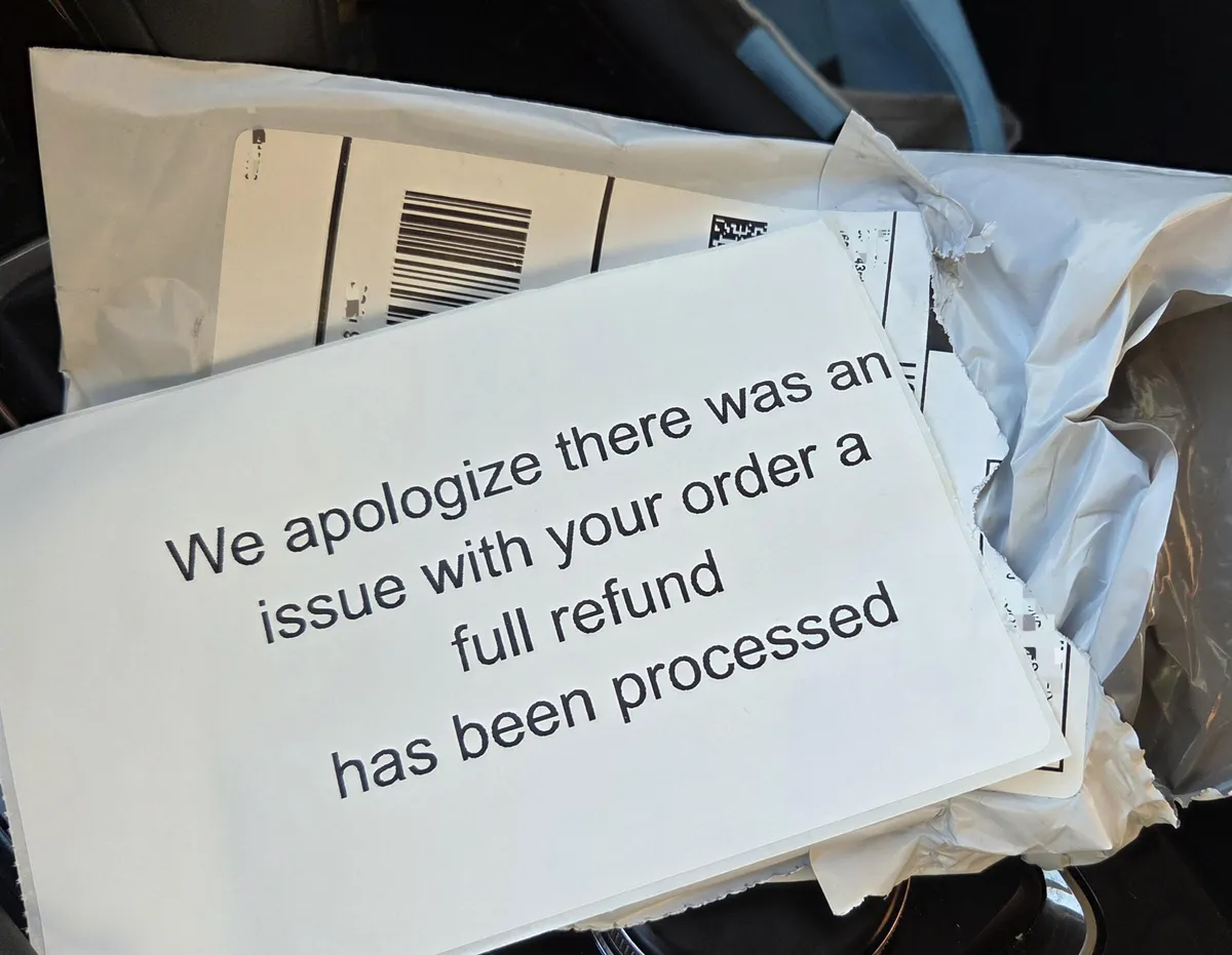 Ordered a book from Amazon and recieved this completely flat package with a message in it 10 days later