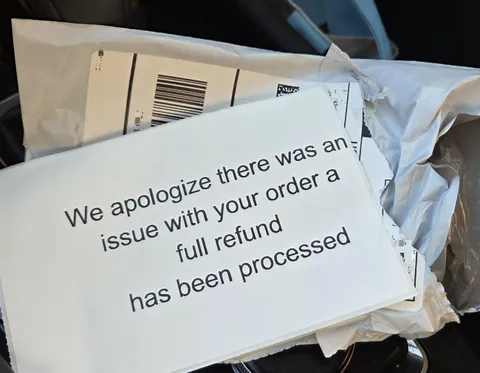 Ordered a book from Amazon and recieved this completely flat package with a message in it 10 days later