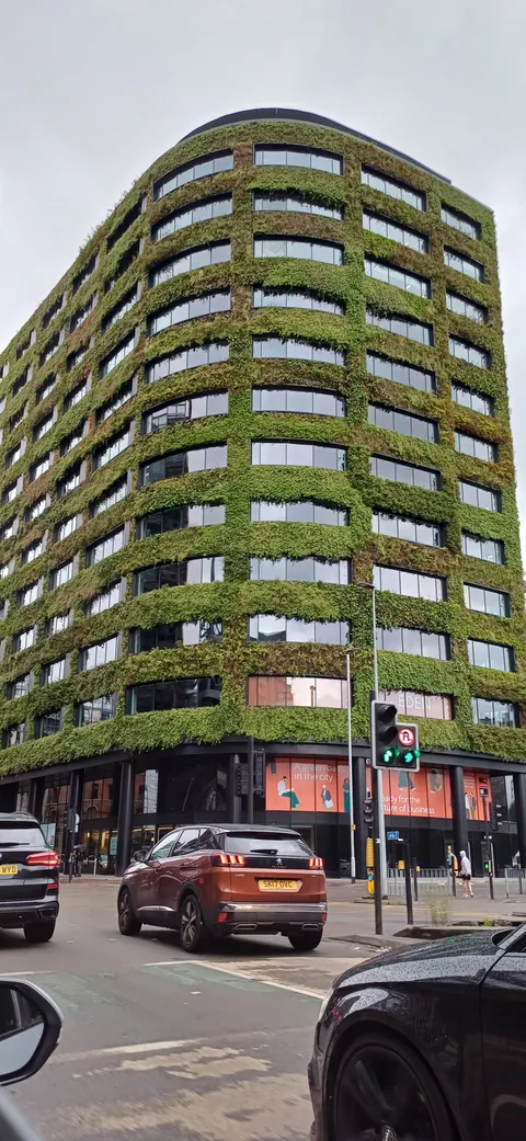 Building covered in moss, in Manchester, England