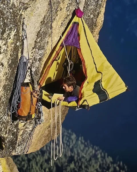 hanging “beds” are called portaledges.. collapsible platforms used by climbers during multi-day ascents