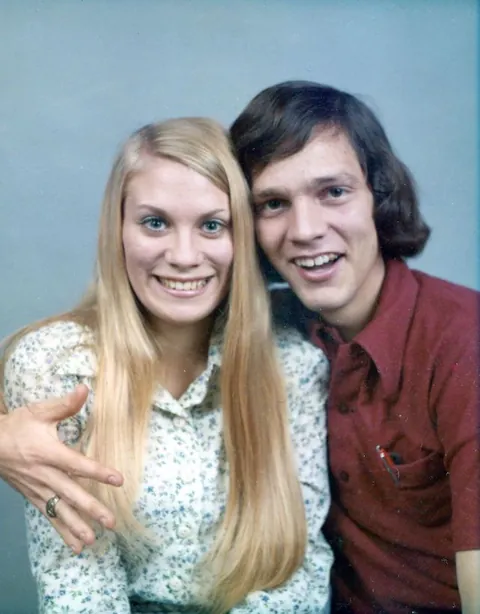 Young couple posing for their professional estudio shot, 1970s.
