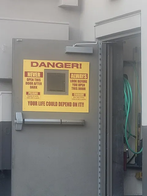 The warning on this door at Taco Bell