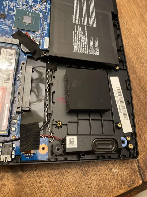 I opened my laptop to get rid of dust and was curious what the little black square is.