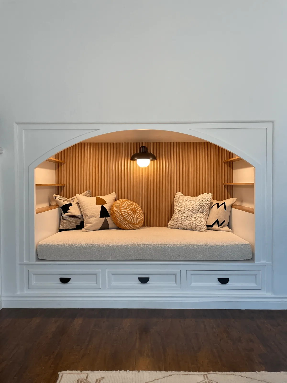 We transformed our 90s entertainment center in a reading nook