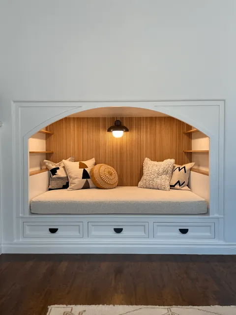 We transformed our 90s entertainment center in a reading nook