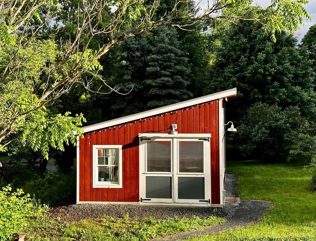I built a 500 sq ft backyard shed studio for my photography business. I personally handled every phase from design to completion except for concrete, electrical, and HVAC. It's insulated and comfortable year round here in New Hampshire.  Ask me anything!