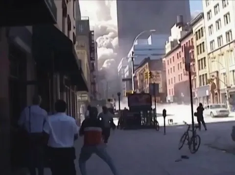 Shop owner saves a woman’s life on 9/11 by giving her shelter in his store as the first tower collapsed.