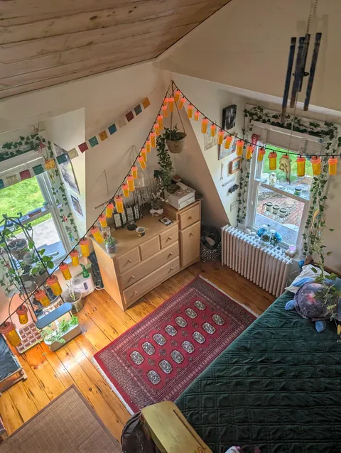my chaotic/cozy bedroom loft