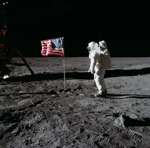 Apollo 11 Mission image - Astronaut Edwin Aldrin poses beside the U.S. flag that has been placed on the moon.