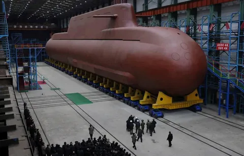 North Korea’s leader, Kim Jong-un, visits the construction site of a nuclear-powered submarine.