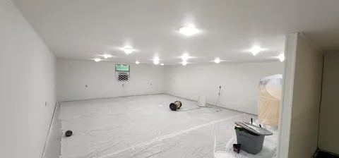 Finished the 2nd floor of my garage into a Home Theatre and Gym.