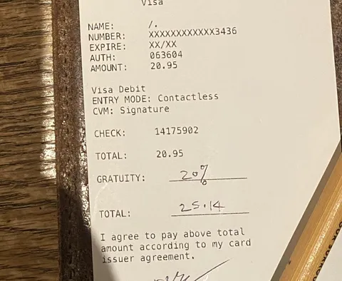 Person that sat at my table before me put % tip on gratuity line instead of dollar amount