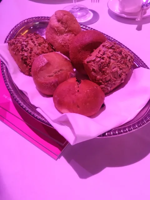 Main meal at a fancy hotel after they forgot my veggie meal -a plate of bread rolls