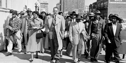 Thurgood Marshall leaving Federal Court after the court ruled Autherine Lucy to be admitted to the University of Alabama. Lucy was later expelled (by the university) for her own safety due to riots and outrage, Birmingham, 1956