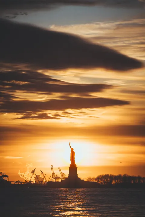 Sunset in NYC I was on vacation there and while going down the streets of Manhattan for sunset shots, I spotted this: