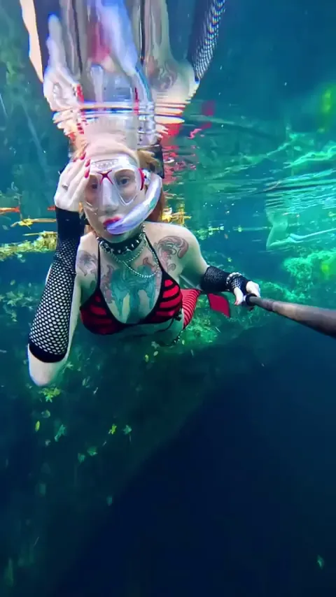 She swims upside down.