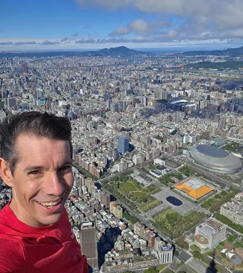 Selfies from Alex Honnold from the top of the Taipei 101 building after free solo climbing it. No ropes, no harness, no safety measures. Nothing but his hands and feet