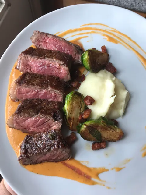 Every week I try and make a restaurant worthy dish. Today was NY strip, brussel sprouts with pancetta, mashed potatoes, and a red pepper sauce.