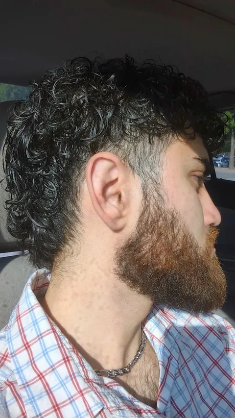 Even though all the hair on my body is black, my mustache and beard are red.