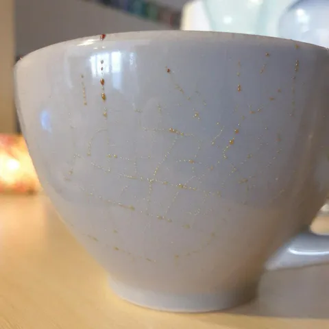 My mug is sweating tea through the cracks in the ceramic.