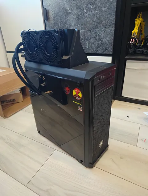 I couldn't find space where the AIO would fit, so I made the space.