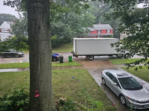 This truck has been parked in front of my driveway for 8 hours.