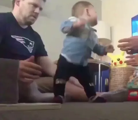 Dad reaction to the first steps of his son