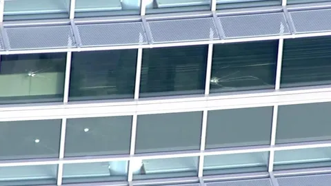 Bullet holes in Windows After Friday’s CDC Shooting (Trump still has not even commented on it.”