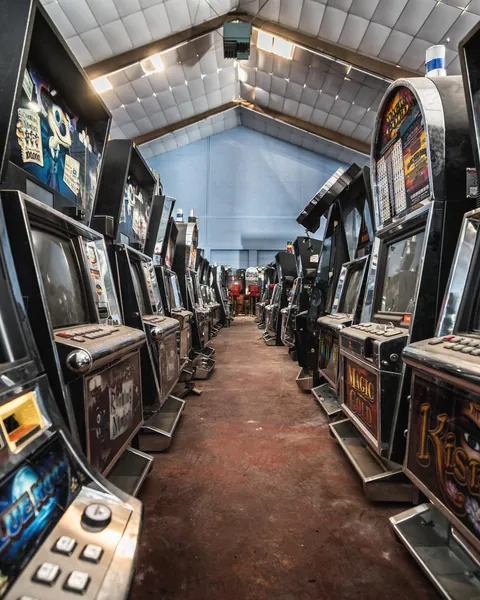 I found an abandoned warehouse filled with arcade machines [1024x1280][OC]