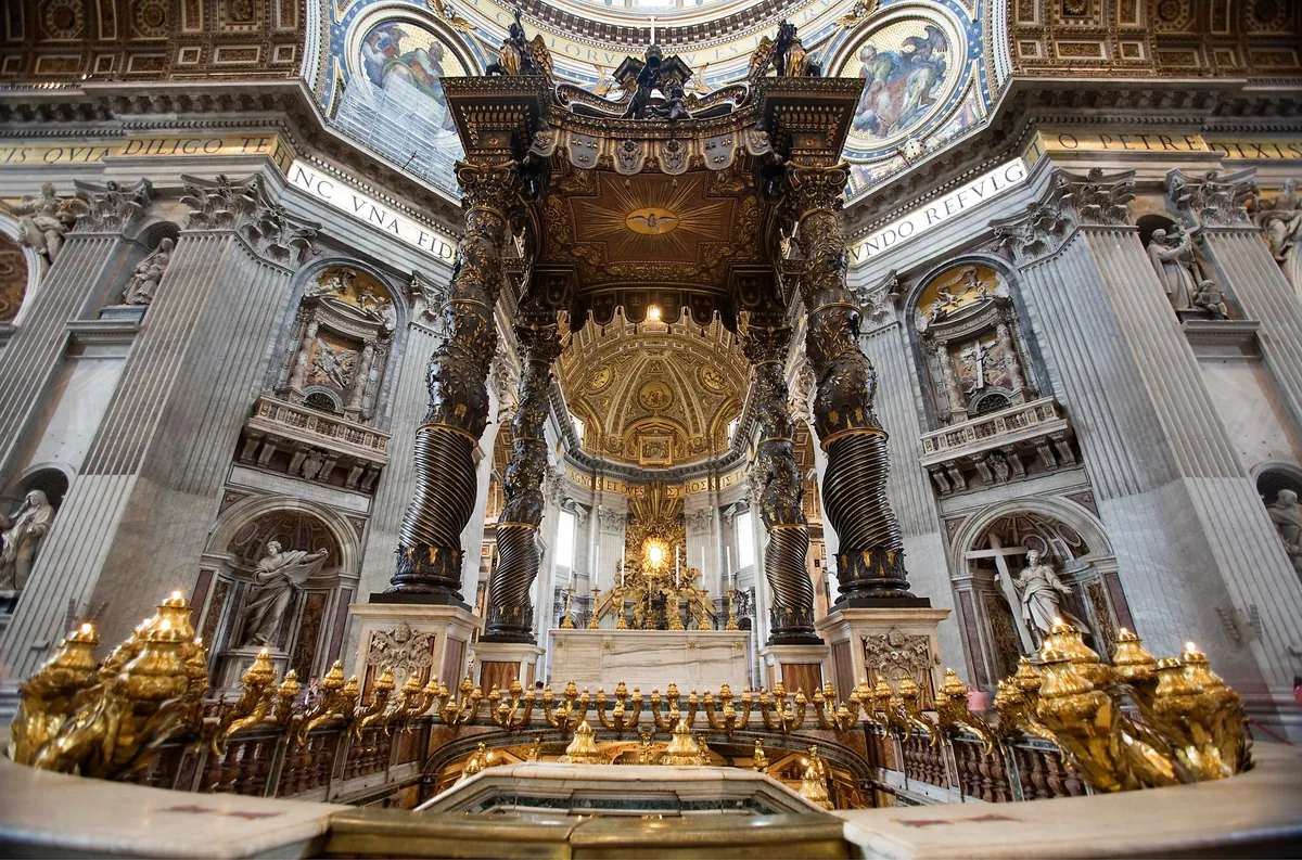 Canopy inside St Peter's Basilica (Vatican), designed by Bernini, completed in 1634, 94 feet tall (28 m), tall like a 6 story building. 