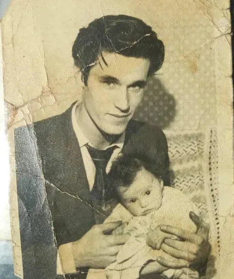 Today was the first time I've ever seen a picture of my grandad. Here he is with my aunt early 1960's