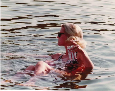 My grandmother, ~1960’s based on the Budweiser can. This is my favorite photo of her.