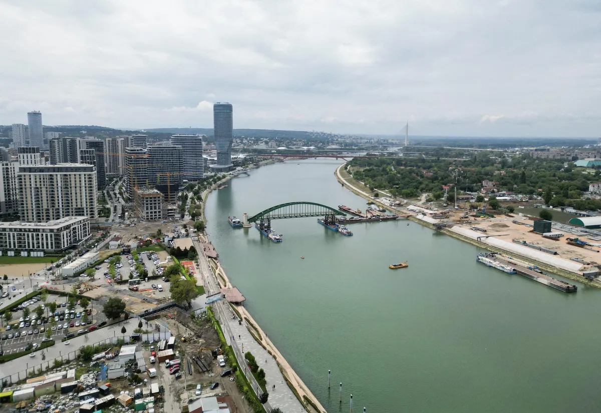 Belgrade city temporarily closes off the international Sava waterway to dismantle the final piece of the Old Sava bridge
